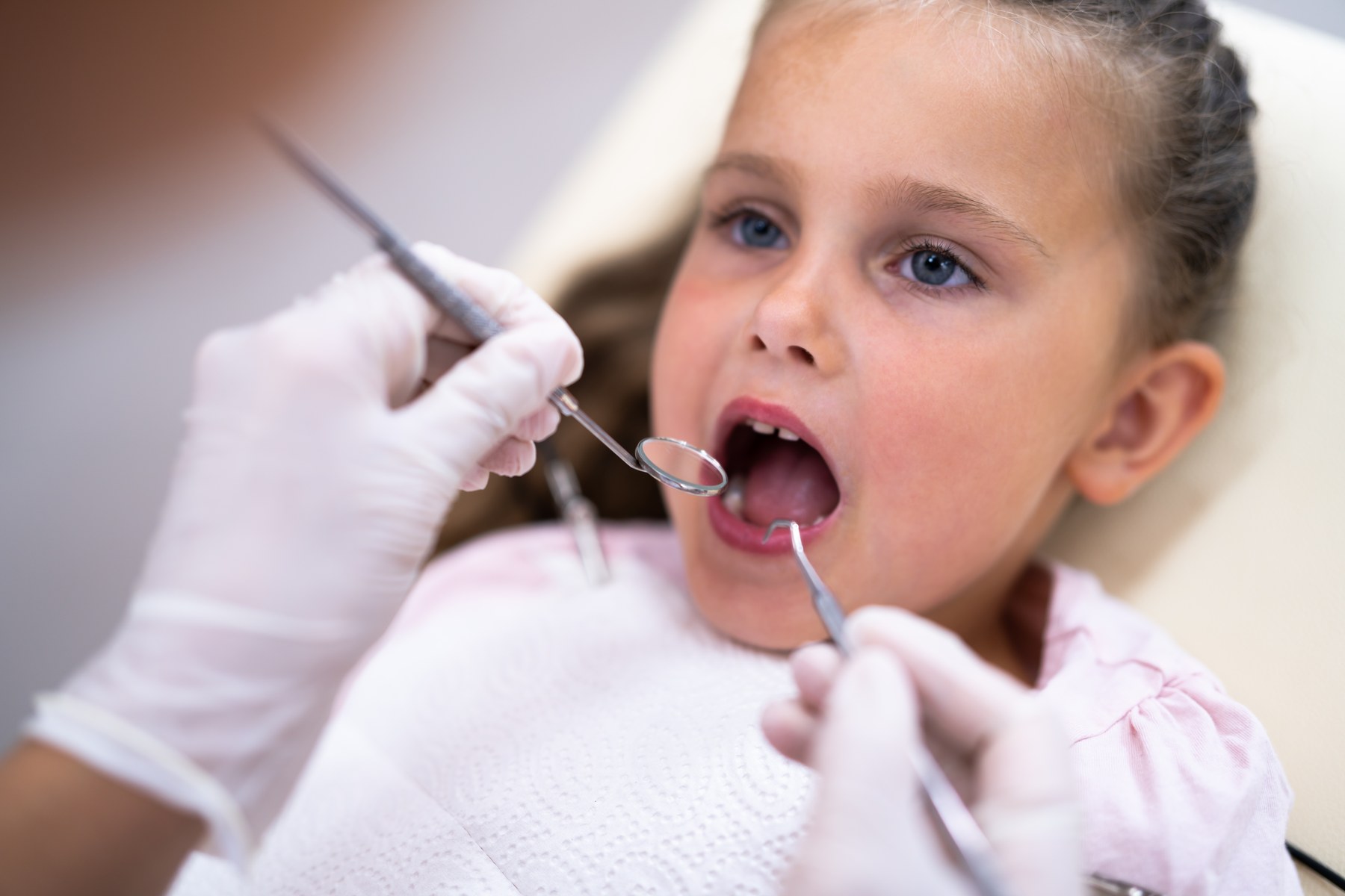 Child receiving a dental exam