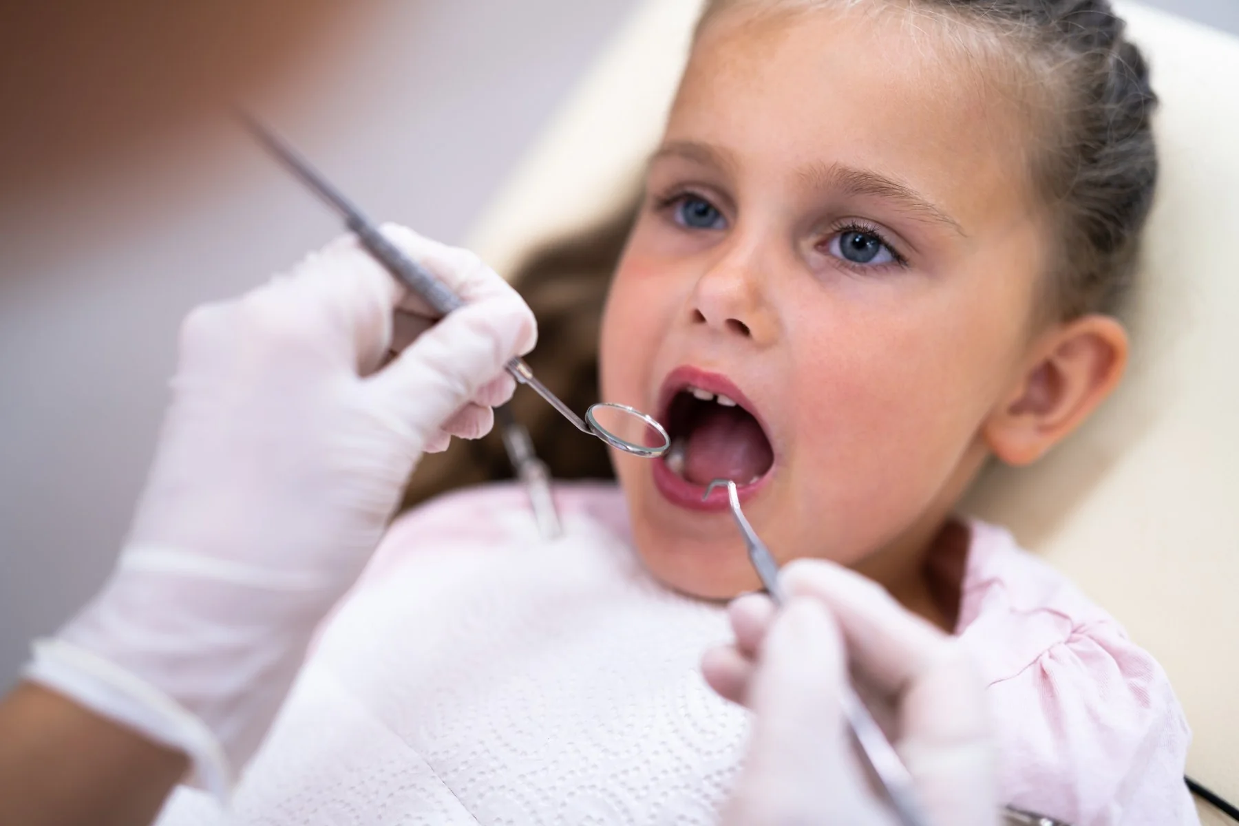 Child receiving a dental exam